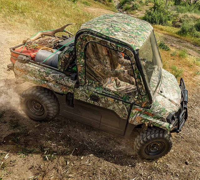 Image of 2023 MULE PRO-MX EPS CAMO in action