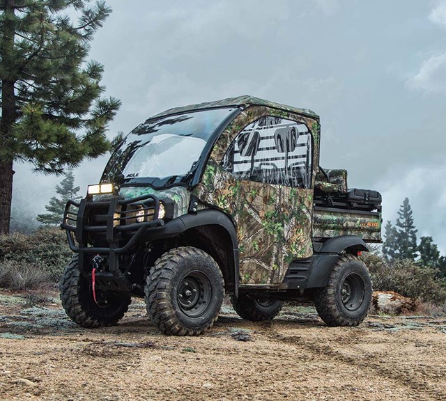 Image of 2023 MULE SX 4x4 XC FI CAMO in action