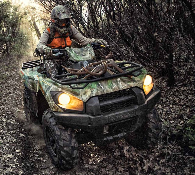 Image of 2023 BRUTE FORCE 750 4x4i EPS CAMO in action