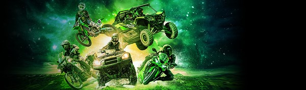 Motorcycle rider on KLX650 on a dirt trail