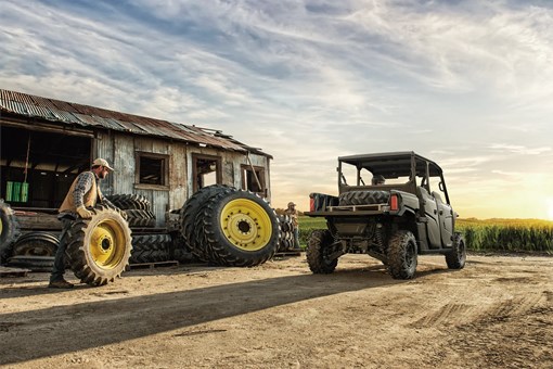 Rear angle of a side x side on a ranch. opens in a new window