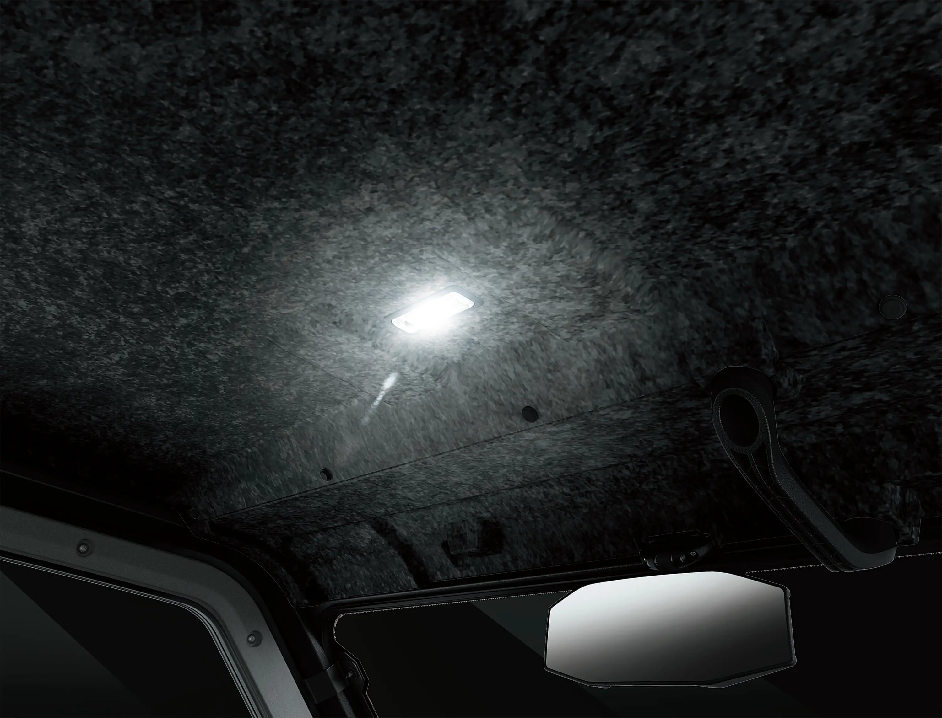 Overhead light on the ceiling of a side x side.