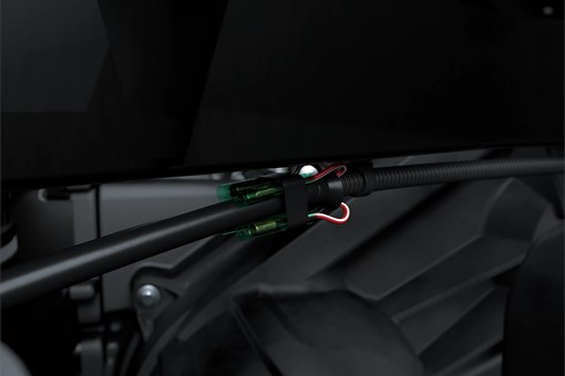 Close-up on a side x side suspension. opens in a new window