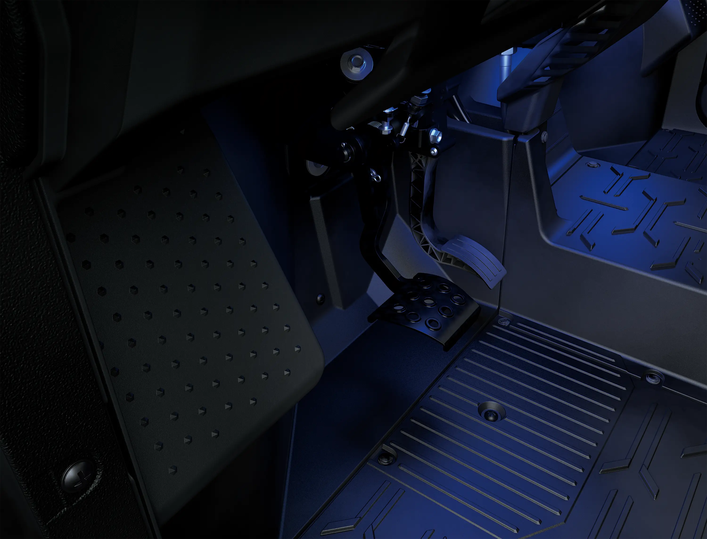 Side x side interior footwell in a blue glow.