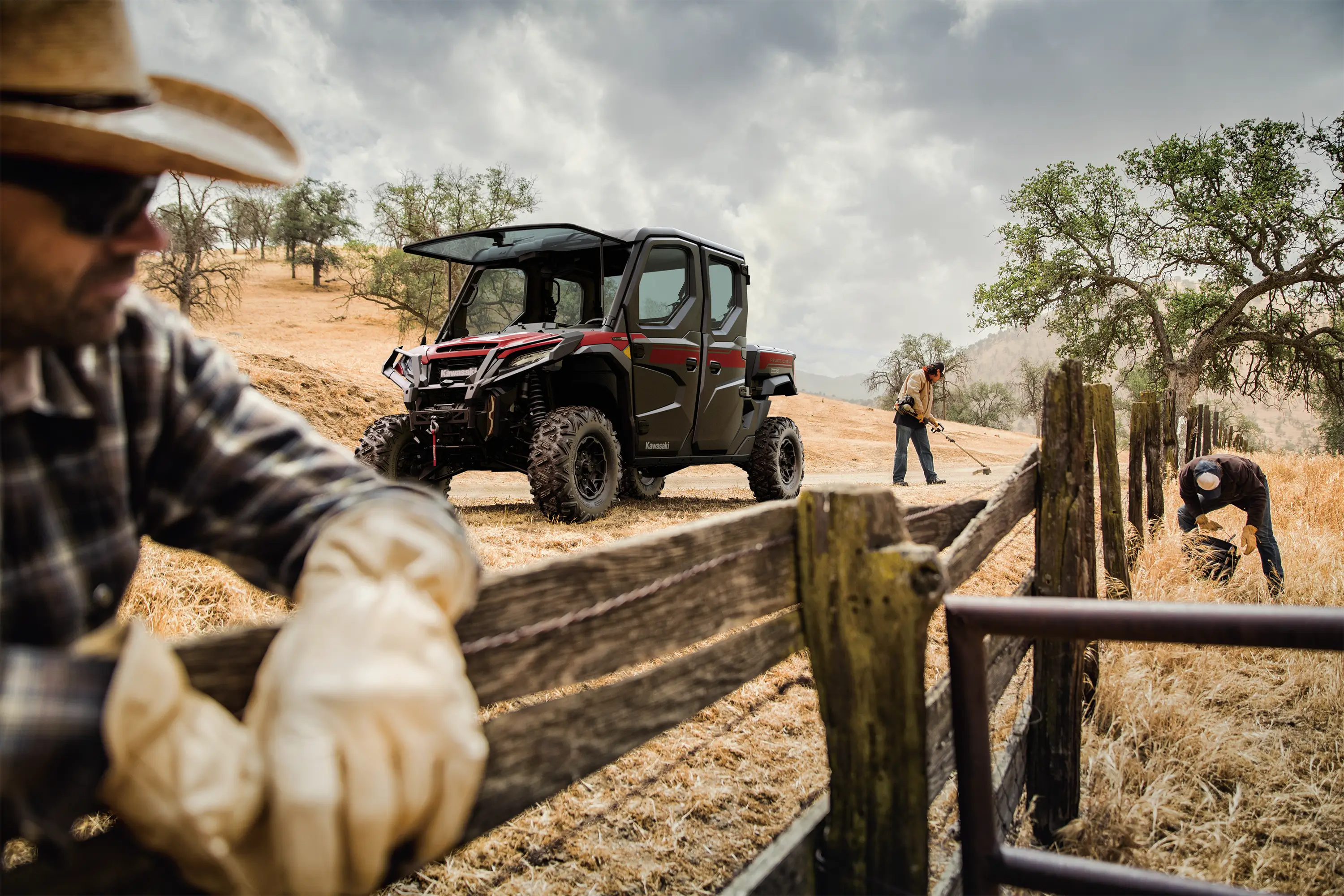 Side x side parked on a ranch.