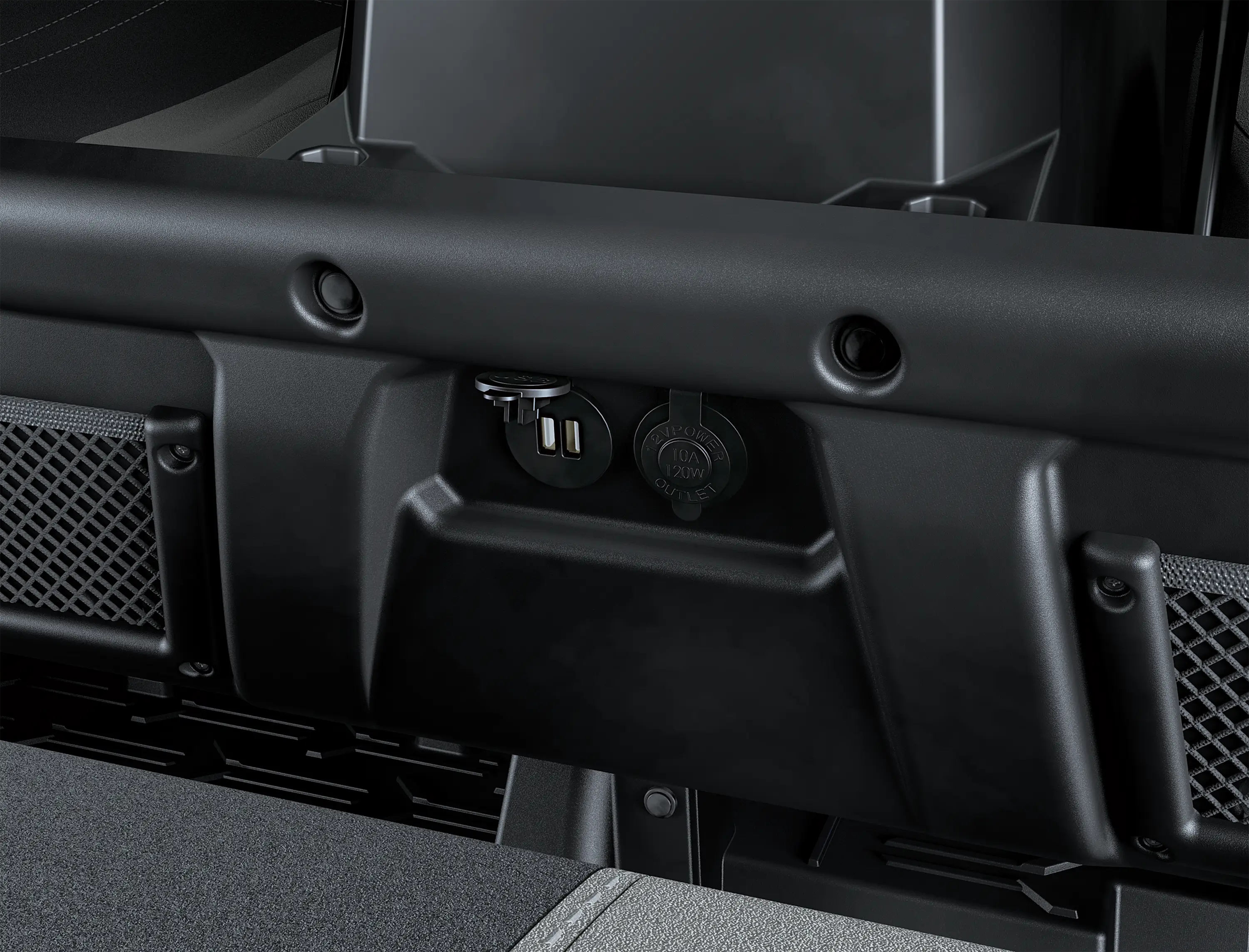 Close-up on a side x side charge ports.