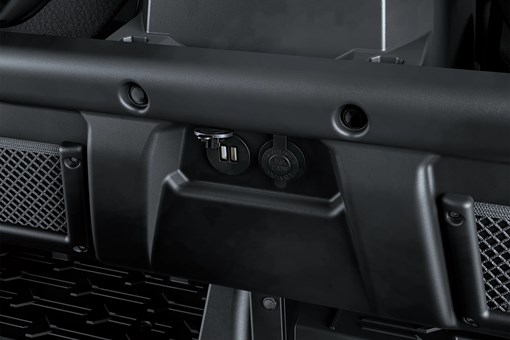 Close-up on a side x side interior charge ports. opens in a new window