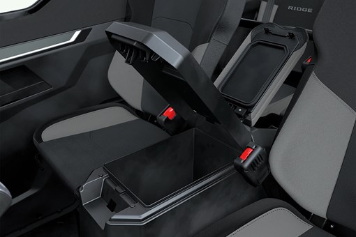 Center console flipped up in a side x side. opens in a new window