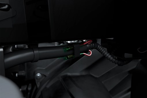 Close-up on a side x side suspension. opens in a new window