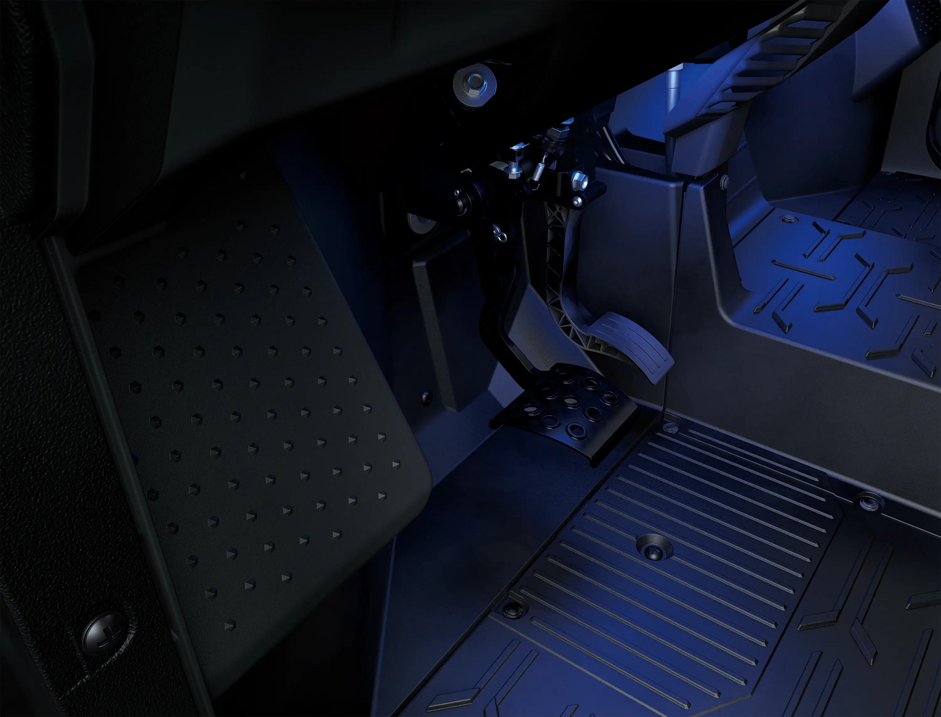 Side x side footwell in blue glow.