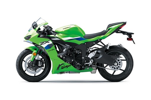 Profile angle of a green motorcycle staged in a white studio background. opens in a new window
