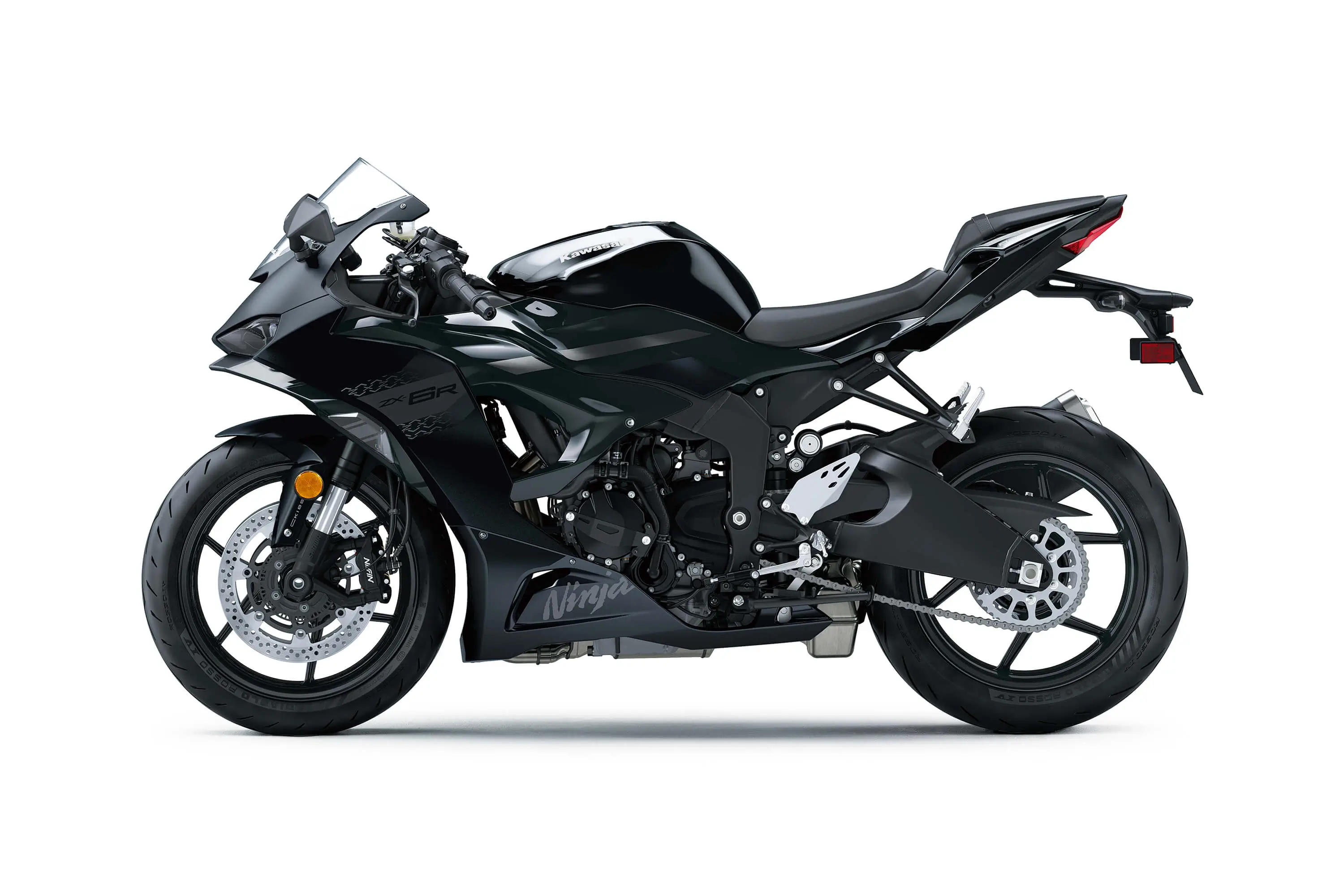 Profile angle of a motorcycle staged in a white studio background.