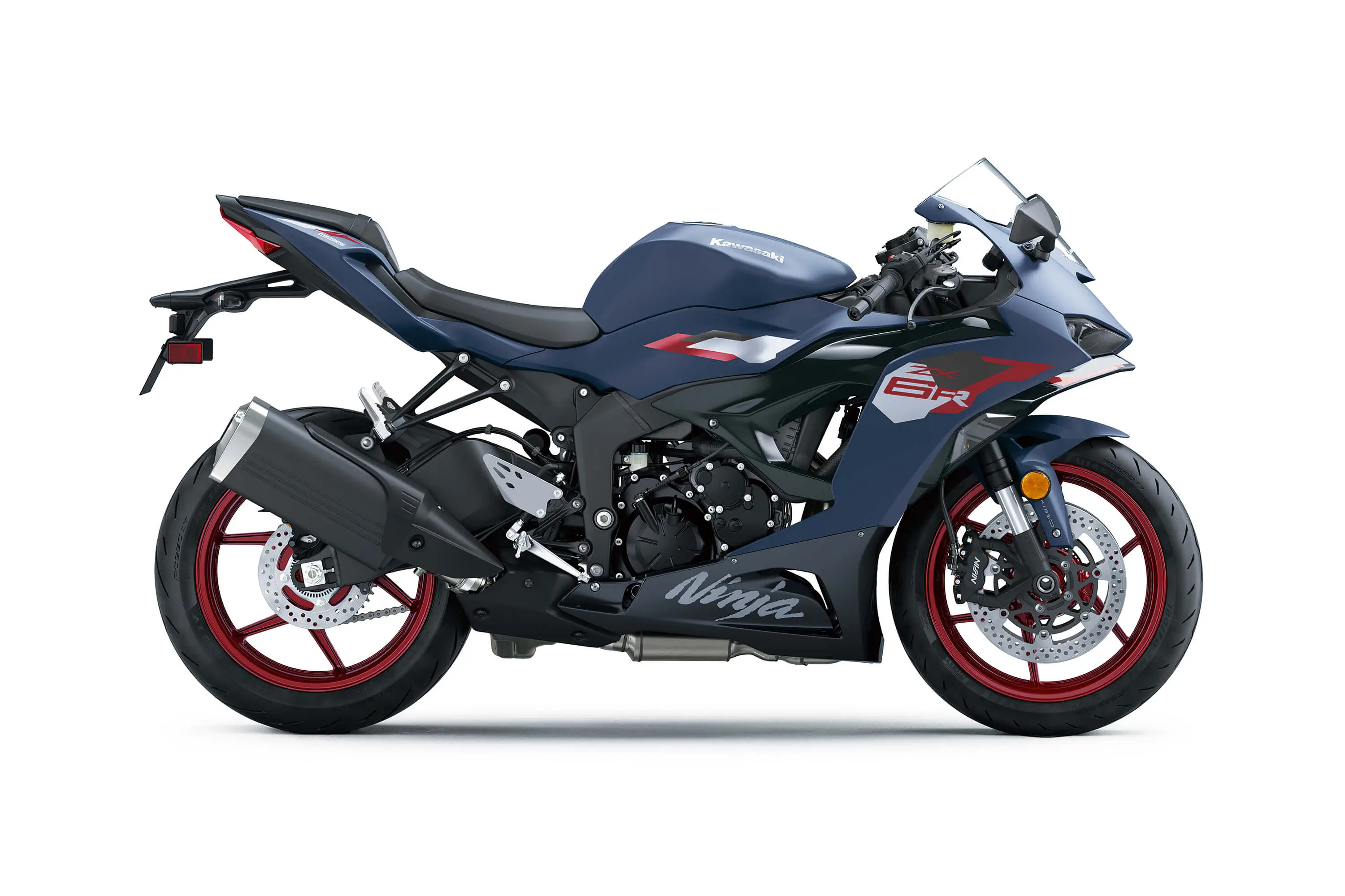 Profile angle of a blue motorcycle staged in a white studio background.