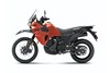 Side angle of a still motorcycle on a white studio background