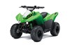 Three-quarter front angle of a green ATV with a white studio background.