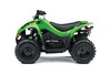 Side angle of a green ATV with a white studio background.