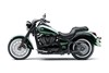 Profile angle of a motorcycle staged in a white studio background.