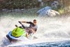 Front three-quarter angle of a person on a Jet Ski.