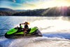 Woman riding a Jet Ski on the water.