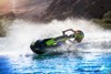 Person leaning and turning on a Jet Ski. 