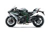 Profile angle of a motorcycle staged in a white studio background.