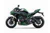 Profile angle of a motorcycle presented in a white studio background.