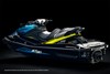 Profile angle of a personal watercraft shown in a black studio background.