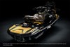 Three-quarter front angle of a personal watercraft staged in a black studio background.