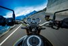 Point of view angle of a rider on a motorcycle on a highway.