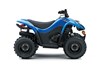 Profile angle of a blue ATV staged in a white studio background.
