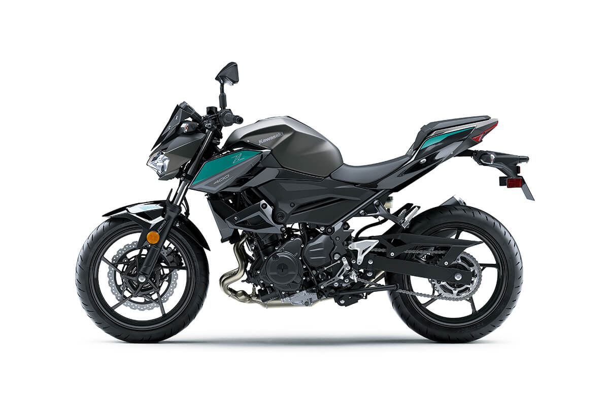 Profile angle of a motorcycle staged in a white studio background.