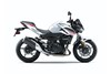 Side angle of a white motorcycle staged in a white studio background.