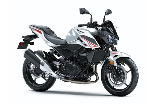  Three-quarter front angle of a white motorcycle staged in a white studio background. opens in a new window