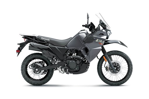 Side angle of a gray motorcycle staged in a white studio background. opens in a new window