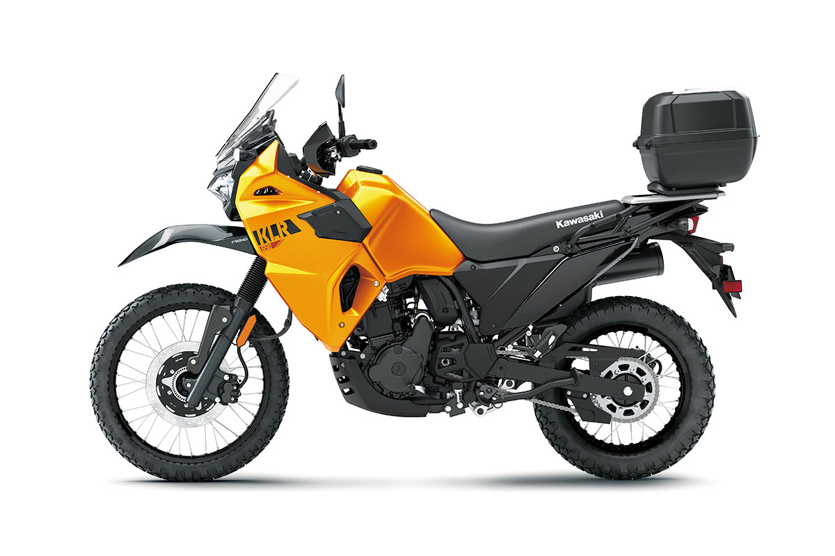 Profile angle of a motorcycle staged in a white studio background.