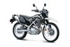 Three-quarter front angle of a grey and black motorcycle staged in a white studio background.