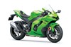 Profile angle of a lime green motorcycle staged in a white studio background.