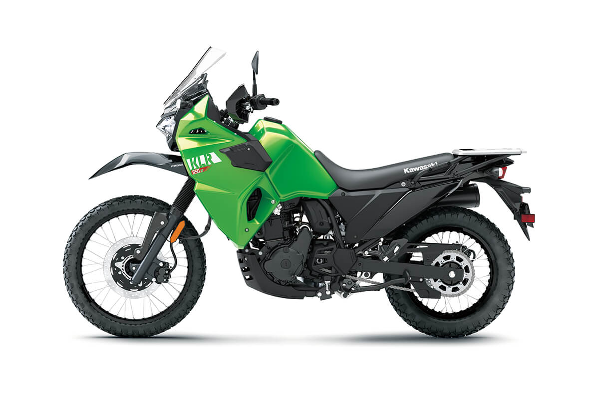Profile angle of a lime green motorcycle staged in a white studio background.