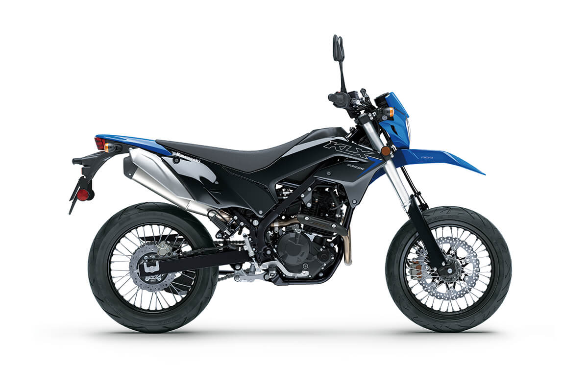 Profile angle of a blue and black motorcycle staged in a white studio background.