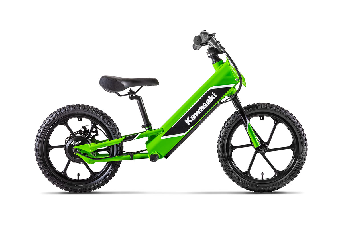 Side angle of an electric balance bike staged in a white studio background.