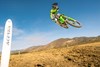 Motorcycle jumping over the camera on track. 