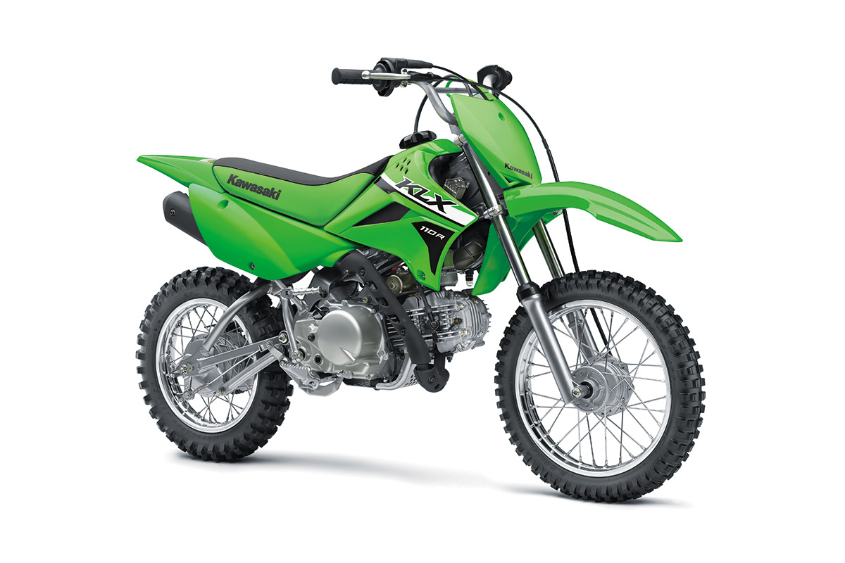 Three-quarter front angle of a green motorcycle staged in a white studio background.