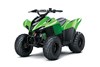 Three-quarter front angle of a green ATV staged in a white studio background.