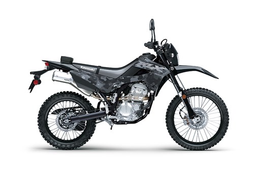 Profile angle of a dark grey motorcycle staged in a white studio background. opens in a new window