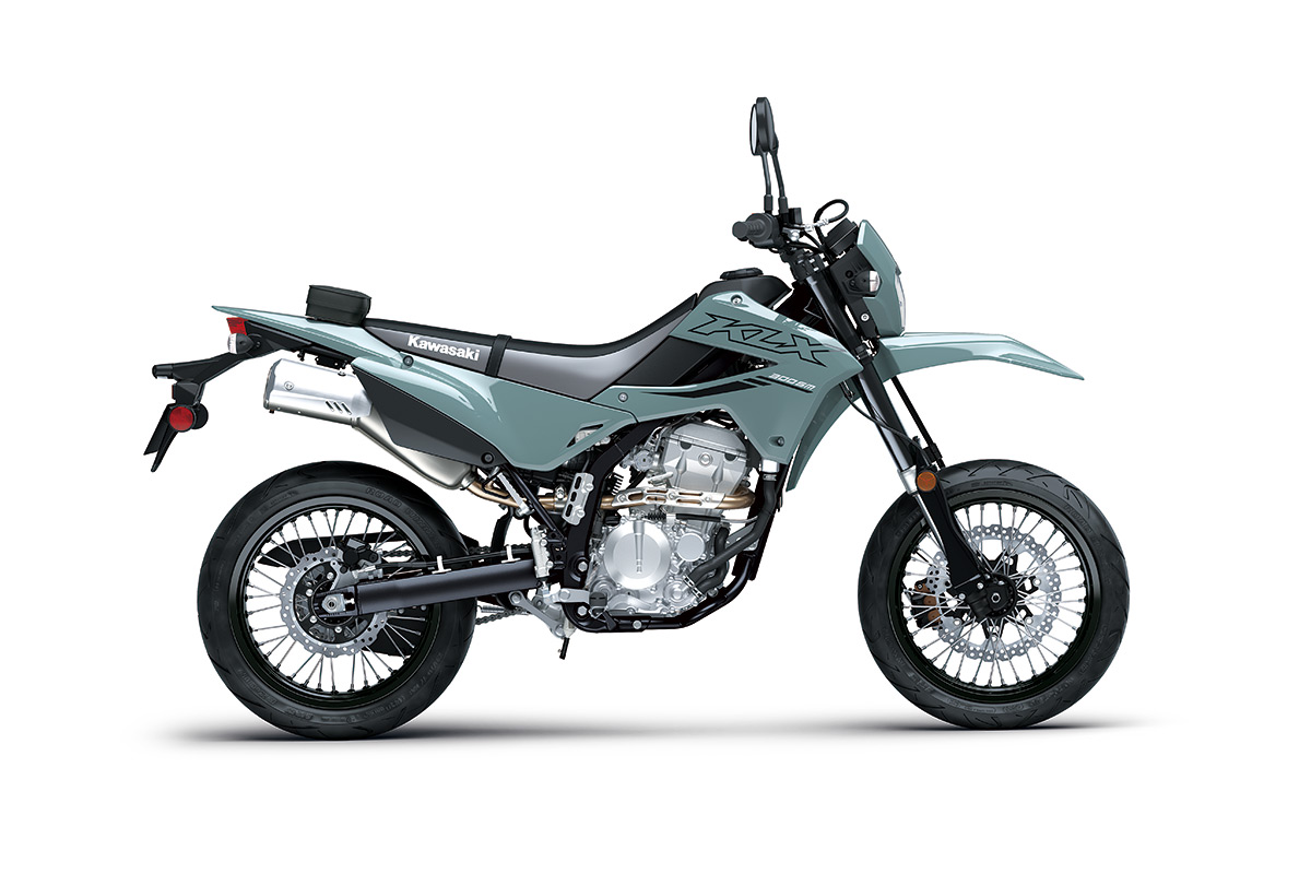 Side angle of a motorcycle staged in a white studio background.
