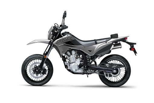 Profile angle of a grey motorcycle staged in a white studio background. opens in a new window