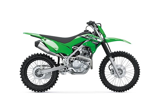 Side angle of a green motorcycle staged in a white studio background. opens in a new window