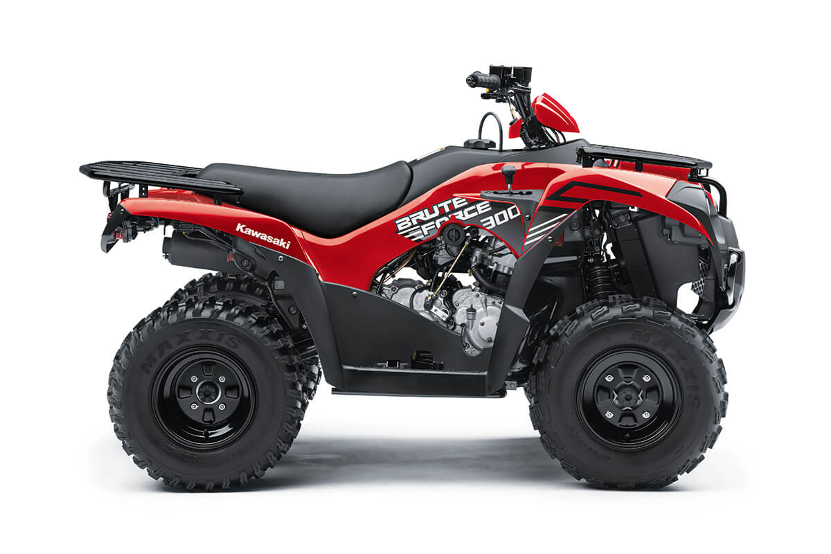 Profile angle of a red ATV staged in a white studio background.