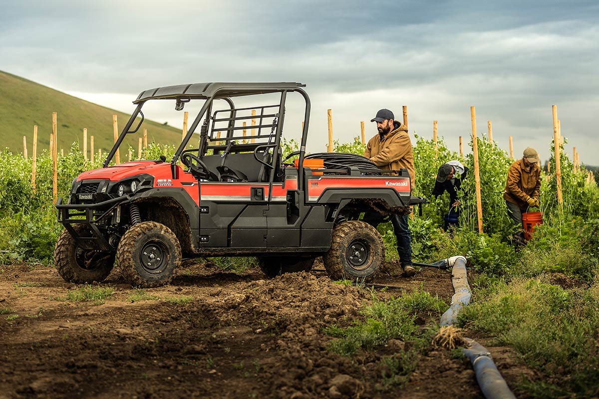 Side angle of a side x side parked in a field.