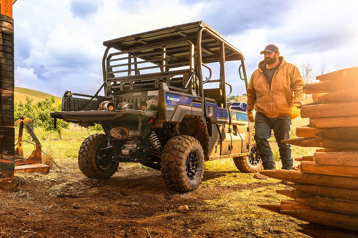 Three-quarter rear angle of a parked side x side off-road.